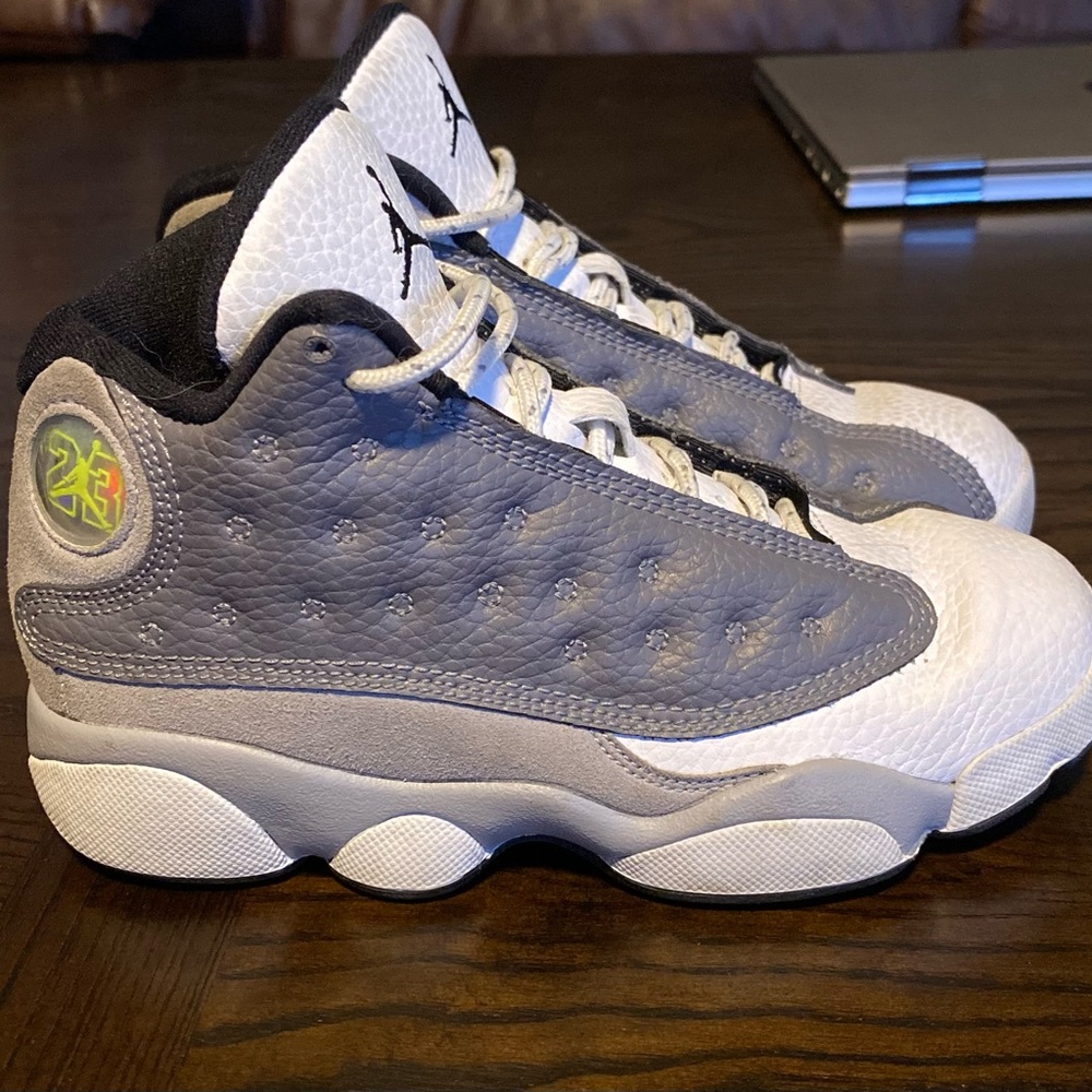 Jordan 13 Retro atmosphere Grey size kids 13. Retails $260 get your deal here!